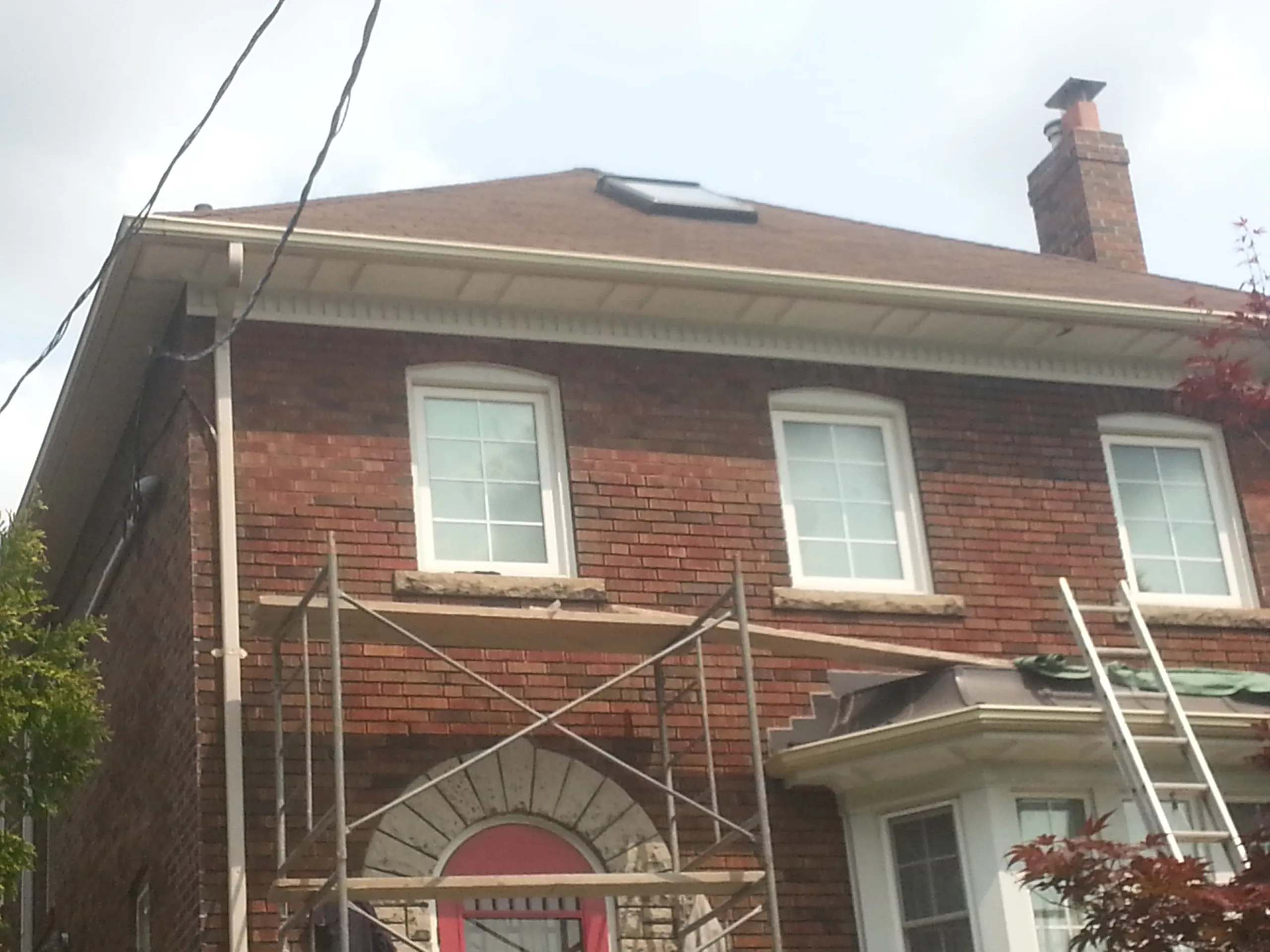Before: Full repointing of a brick home (Tuckpointing)