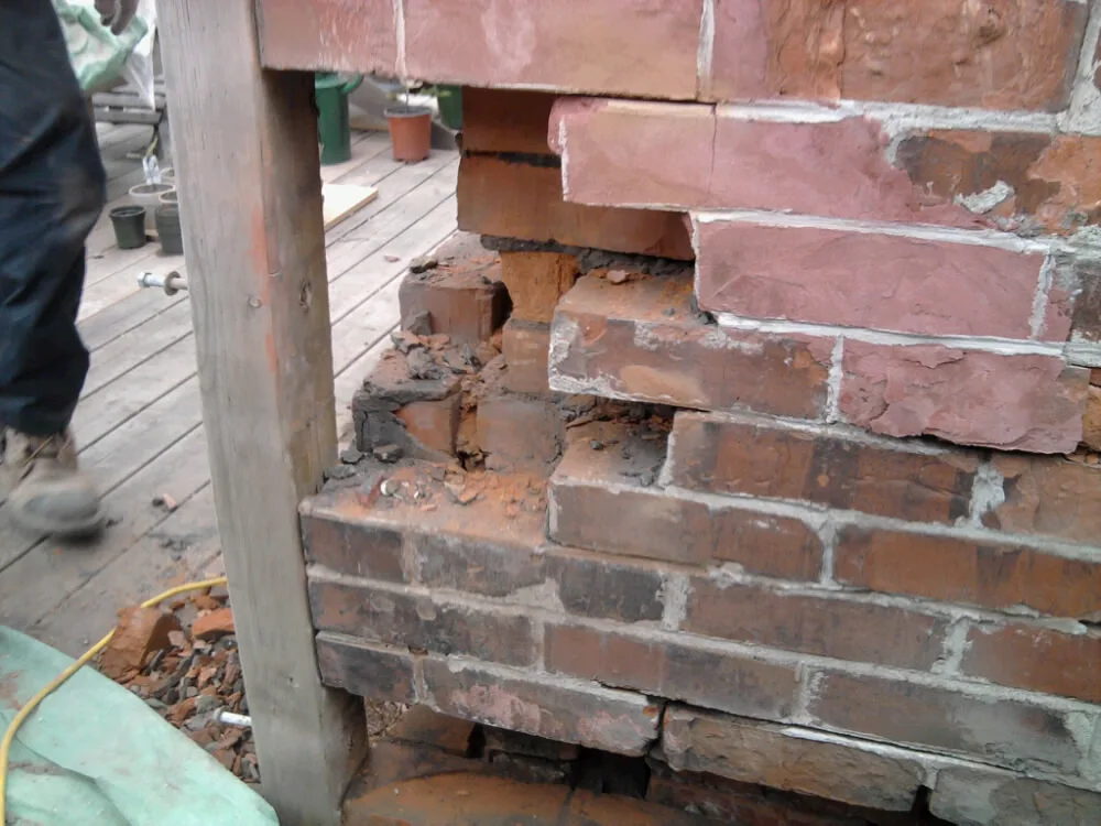 Before: Crumbling wall rebuilt (Brick Replacement)